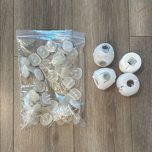 White baby safety door knob covers and outlet covers